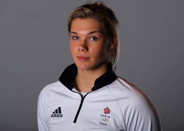 Grace Reid proudly wears her Team GB Olympic kit, one of the rewards for winning the British title