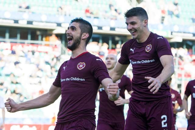 Igor Rossi celebrates scoring his second and Hearts' fourth goal. Pic: Paul Devlin/SNS