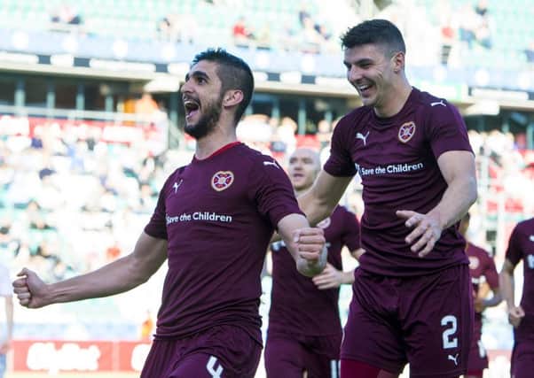 Igor Rossi celebrates scoring his second and Hearts' fourth goal. Pic: Paul Devlin/SNS