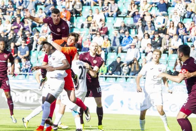 Callum Paterson's early header sent Hearts on their way