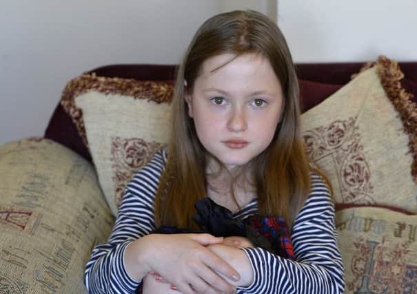 Nine-year-old Aisling Stitt burned on her legs in the water at Braidburn Valley Park. Picture: Julie Bull