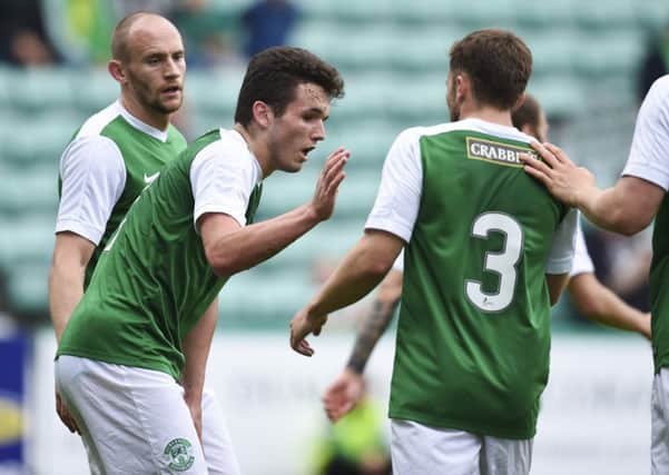 John McGinn celebrates with his Hibs team-mates after he scored in the 4-1 friendly victory over Motherwell. Pic: SNS