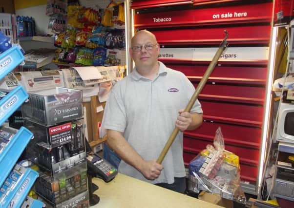 Mark Caulfield chased knife-wielding thief out of his shop with a window pole. Picture: Contributed