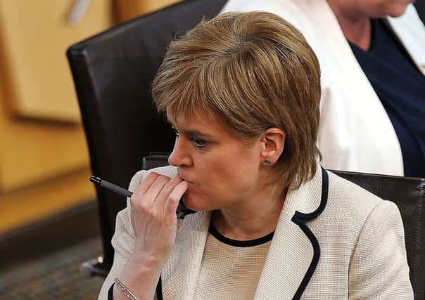 First Minister Nicola Sturgeon looking thoughtful during a break in the Scottish Parliament debate on the EU referendum result. Picture: AFP/Getty