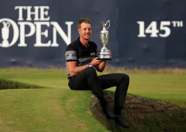 Henrik Stenson shows off the Claret Jug after an incredible final day at the Open. Pic: Getty