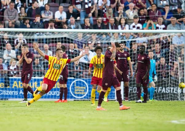 Birkirkara's Christian Bubalovic, centre, celebrates scoring his side's opening goal against Hearts