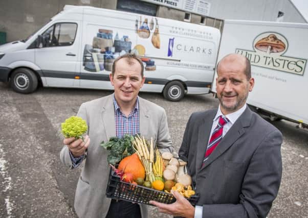 Fine Foods owner Allan Currie with Michael Mackie from the Clydesdale Bank.