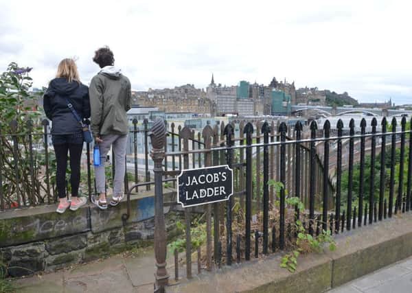 A couple take in the view from the top of Jacob's Ladder. Picture: Jon Savage