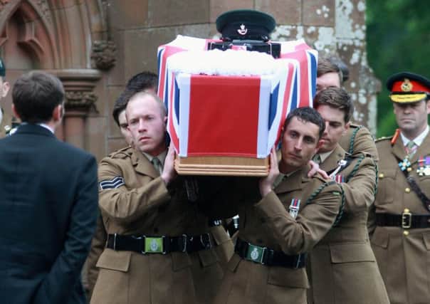 Josh Hoole's coffin is carried in to church by fellow soldiers. Picture: Katielee Arrowsmith/SWNS