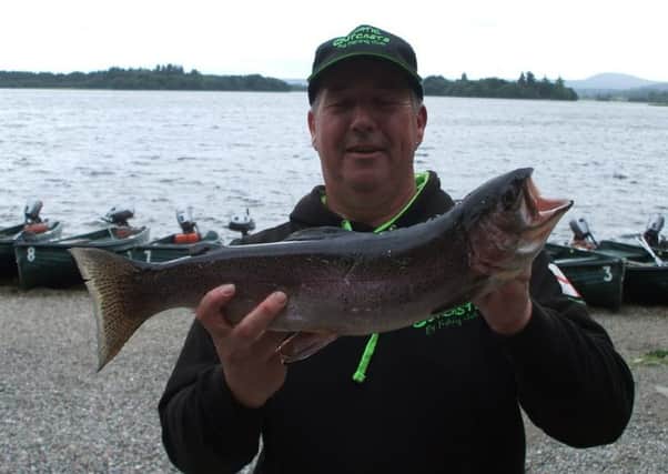 Clive Parry from Chester with a 5lb 4oz 
rainbow taken on a Tequila Blob from Lake of Menteith
