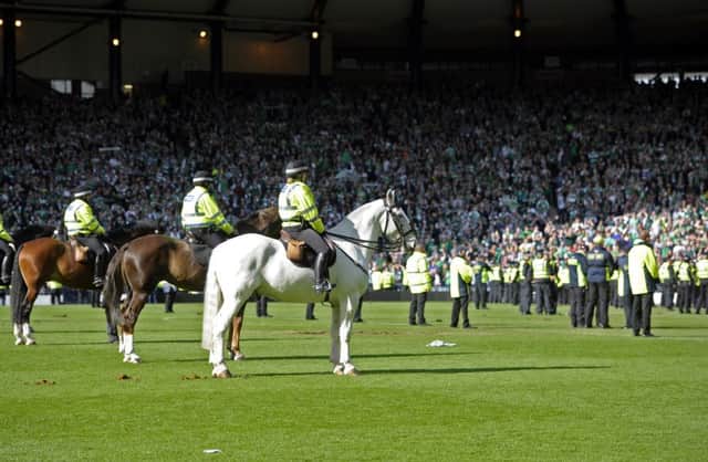 A total of 55 arrests have now been made over the disorder following the Scottish Cup final. Picture: Neil Hanna