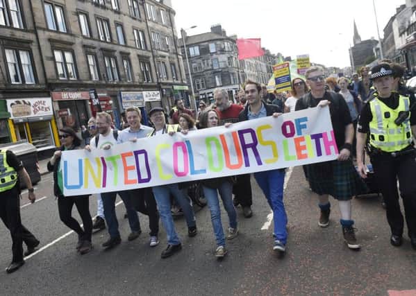 Anti racism march leaves Pilrig Park and heads down Leith Walk ending in Leith Links.  The march was met by an opposing protest by Scottish Defence League who were based at the Kirkgate. Picture; Greg Macvean
