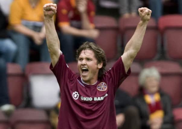 Saulius Mikoliunas came from off the bench to score Hearts third just as Motherwell looked set to nick a point