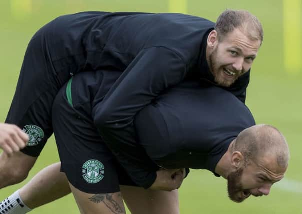 Martin Boyle and Jordon Forster take part in a strength exercise in training. Picture: SNS
