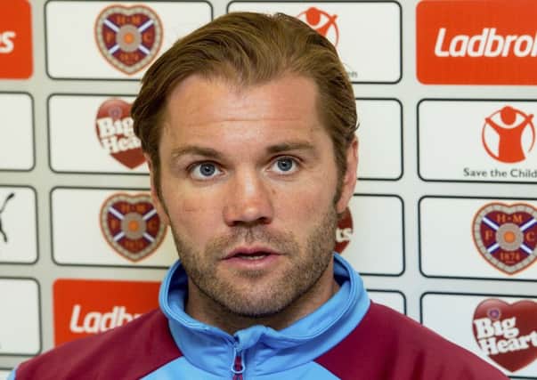 Hearts head coach Robbie Neilson is keen to pit his wits against Brendan Rodgers tomorrow
