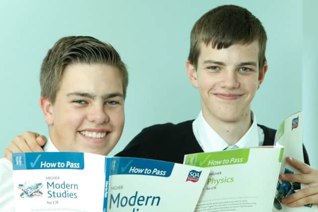 Thomas and Adam, Anderson. 16 year old twins who will recieve their exam results today. Picture; Toby Williams