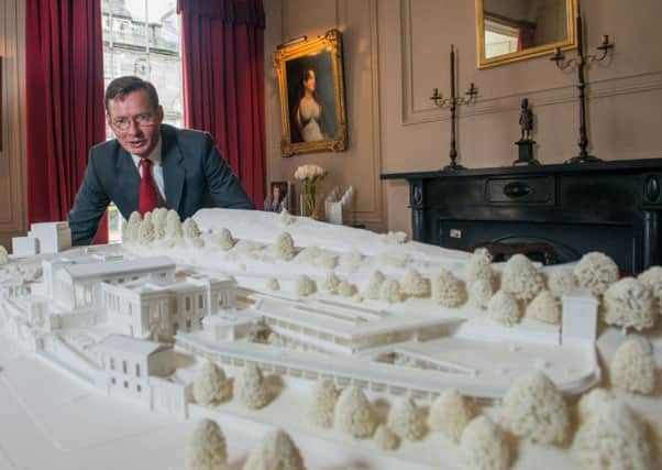 William Gray Muir with the model of the proposed music school at the old Royal High. Picture: Ian Georgeson