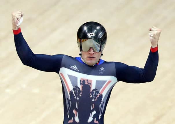 Capital cyclist Callum Skinner celebrates crossing the line to clinch gold for Great Britain in Rio