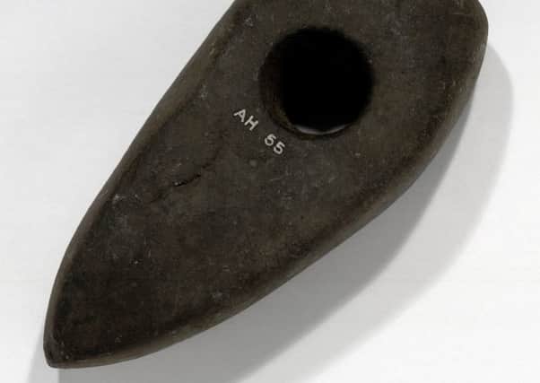 A stone axe-hammer found at Roslin in Midlothian. Photo: National Museums Scotland/Scran