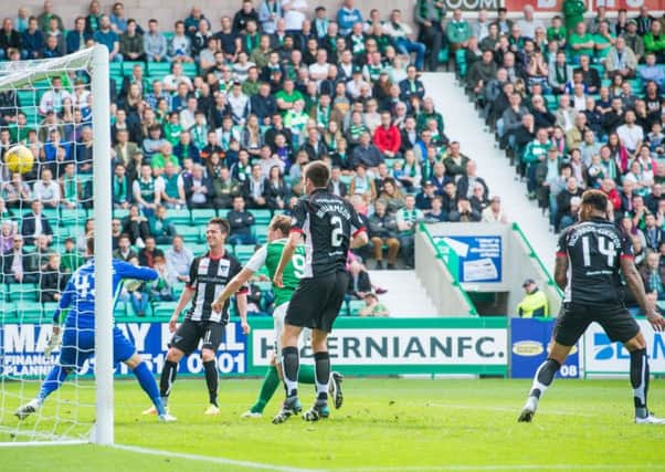 A misplaced header from Ben Richards-Everton put Hibs ahead in front of a big crowd at Easter Road. Pic: Ian Georgeson