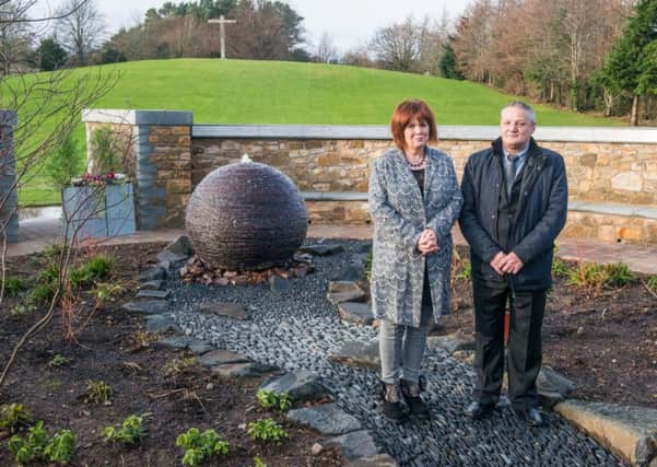 Dorothy Maitland and Willie reid looks at a memorial for her daughter. Picture; Ian Georgeson