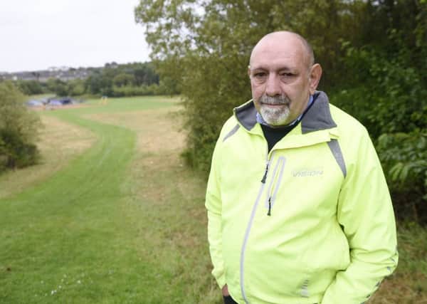 Local resident Bruce Bennet by Burdiehouse Burn Valley Park where youths have been causing havoc. Picture: Greg Macvean