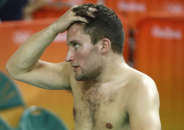 Callum Skinner reacts to the news he'd been relegated in the keirin