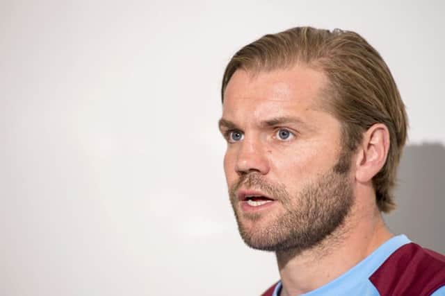 Head coach Robbie Neilson has rubbished claims that director of football Craig Levein picks the Hearts team. Pic: SNS