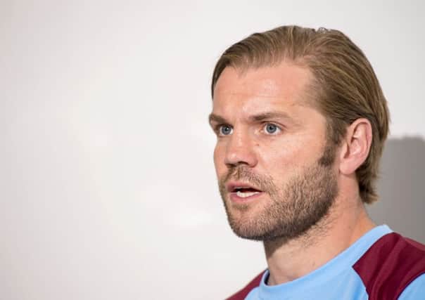 Head coach Robbie Neilson has rubbished claims that director of football Craig Levein picks the Hearts team. Pic: SNS