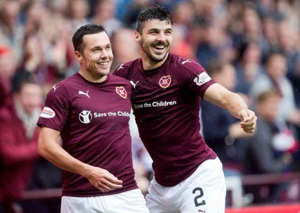 Don Cowie, left, put in a fine display for Hearts in the 5-1 defeat of Inverness. Pic: SNS