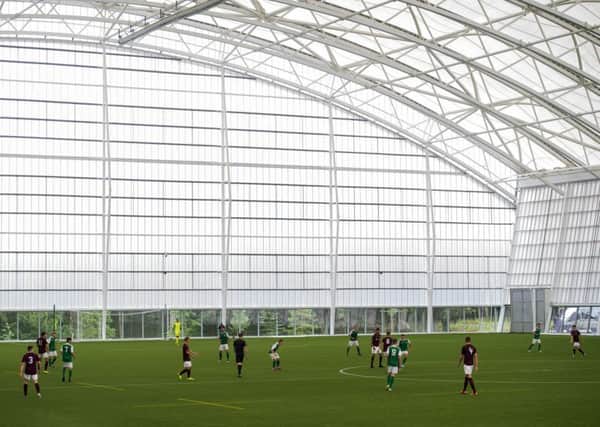 The wee derby is played under a roof for the first time at Oriam. Pic: SNS