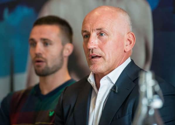 Josh Taylor, left, and manager Barry McGuigan. Picture: Ian Georgeson