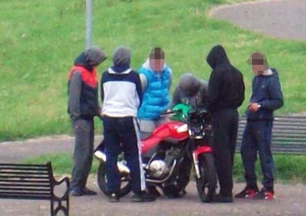 Youths in Pilton Park with a suspected stolen motorbike.