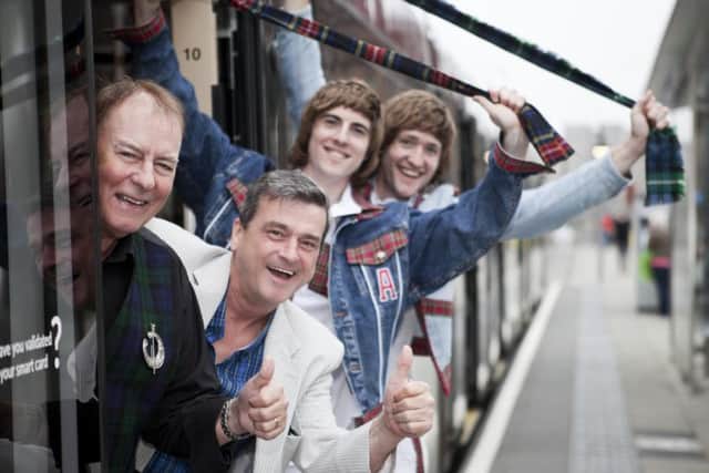 Alan Longmuir and Les McKeown pose with the boys from 'I Ran With The Gang', a show based on the early life of Alan, and the forming of the Bay City Rollers.