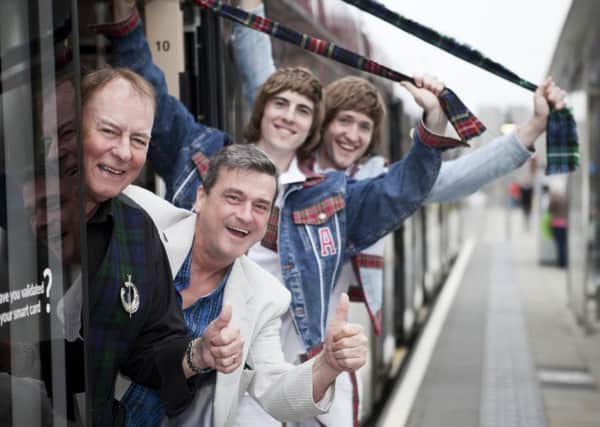 Alan Longmuir and Les McKeown pose with the boys from 'I Ran With The Gang', a show based on the early life of Alan, and the forming of the Bay City Rollers.