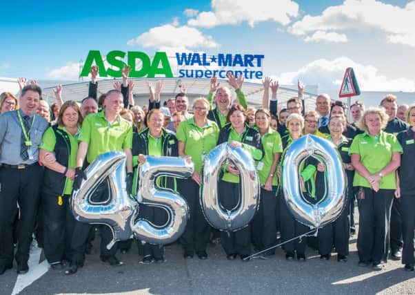 Asda Edinburgh colleagues have 4,500 years experience with the company . Picture; Ian Georgeson