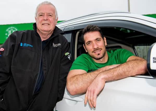 Hibs' Ofir Marciano (right) with Hibs legend Pat Stanton. Picture: SNS