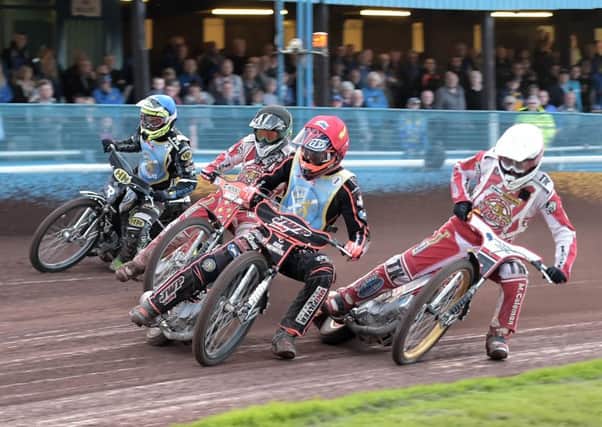 Heat six: Monarchs captain Sam Masters (red) leads Nike Lunna, Richard Lawson and Mark Riss