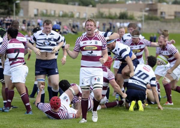 Euan Dods of Watsonians celebrates after they were awarded a penalty try. Picture: Neil Lennon