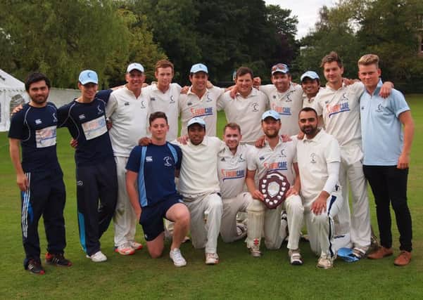 A victorious Carlton team show off their CSL Eastern Premiership shield after being crowned champions