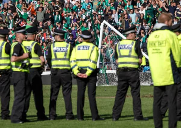 Police were on the pitch following a pitch invasion. Picture; Robert Perry