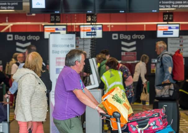 Passengers will be charged Â£5 to use a fast-track security service at Edinburgh Airport. Picture: Ian Georgeson