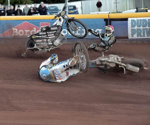 Mark Riss (red cap) collides with Max Clegg in heat 14 against Redcar. Picture: Ron MacNeil