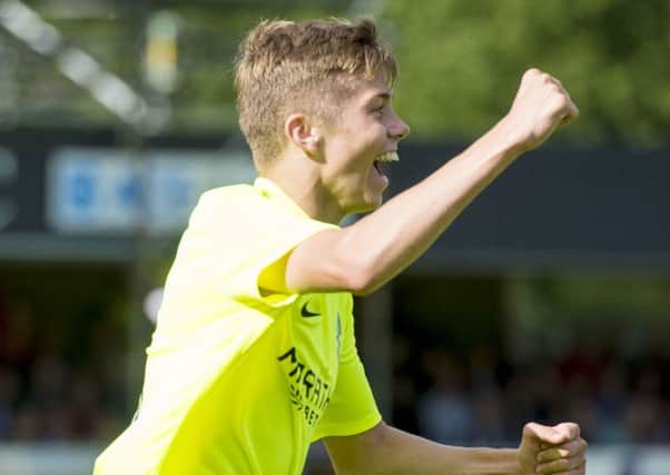 Fraser Murray celebrates opening the scoring for Hibs away at Turriff