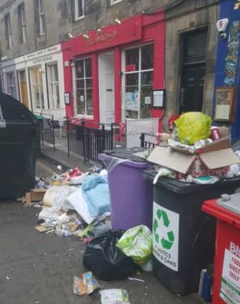 Overflowing rubbish bins - Edinburgh
outside Hanam's Restaurant on  Johnston Terrace