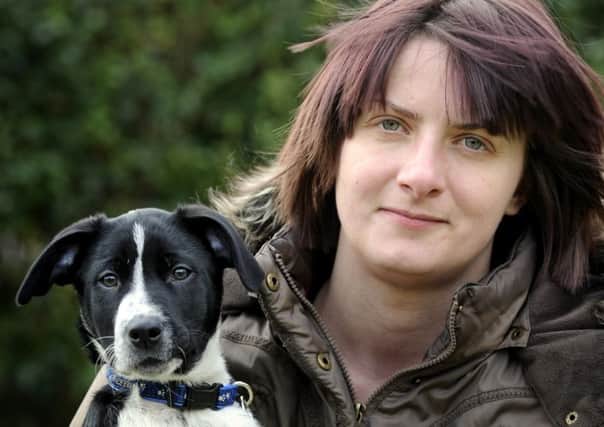 Erin Sutherland  with her dog Marley. Picture: Jane Barlow