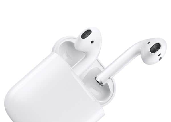 The AirPods contain sensors that can tell when they are in a user's ears, and can be connected to an iPhone or Apple Watch. Picture; PA