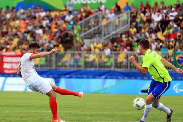 Preston Athletic player David Porcher strikes home his fine goal against Brazil