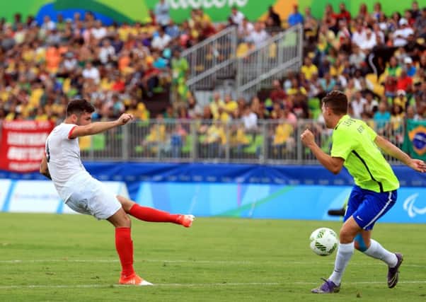 Preston Athletic player David Porcher strikes home his fine goal against Brazil