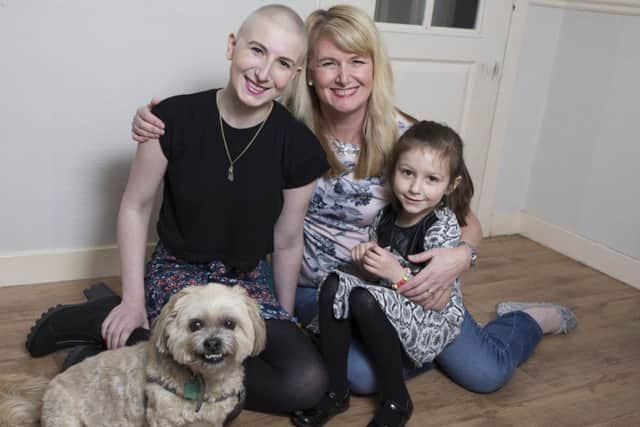 Francesca Mancini with her sister Chiara, 5, plus her mum May and dog Chico.
